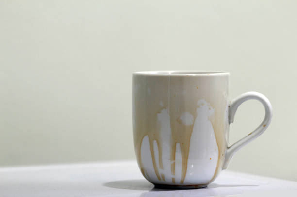 istock Coffee stain on  white coffee cup with white background 1190746792