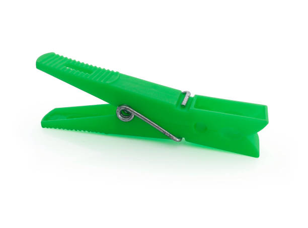 istock Green plastic clothespin isolated on white background 1190750038