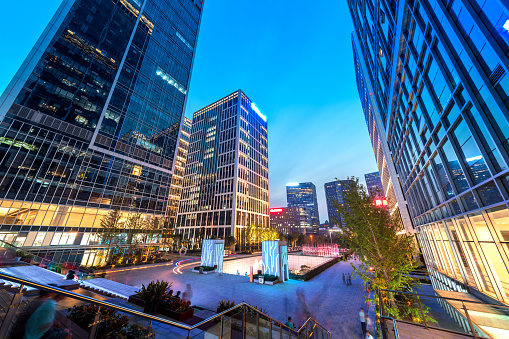 City square and modern high-rise buildings, night view of Jinan, China.