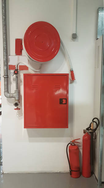 istock fire hose extinguisher for building safety 1190754455