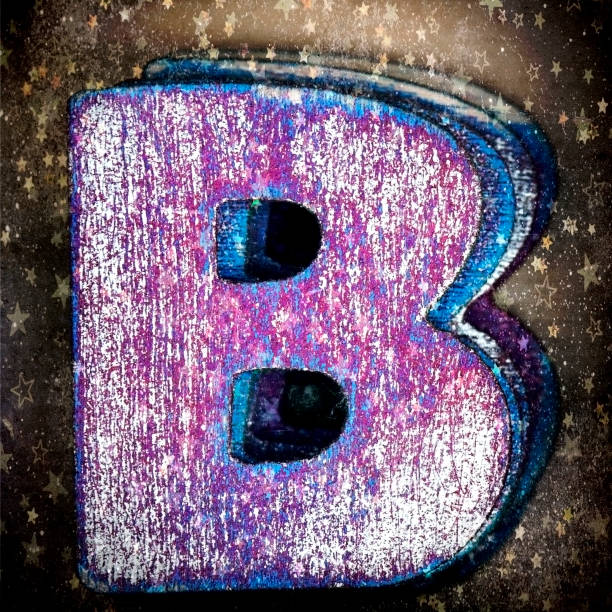 istock old wooden letter B  in a box 1190758555