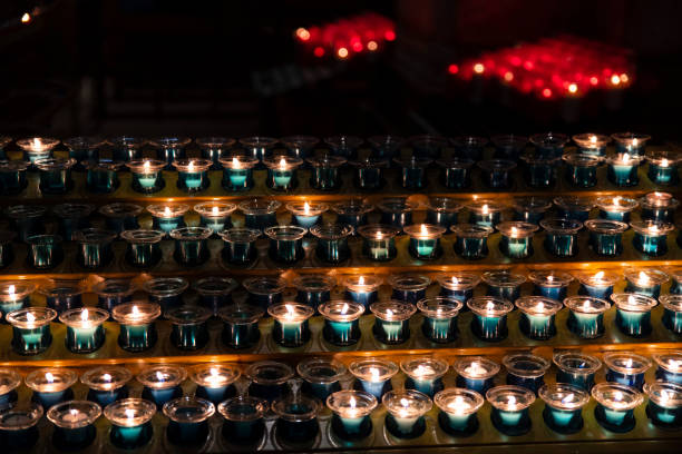 istock Close-up on candles in a church 1190760675