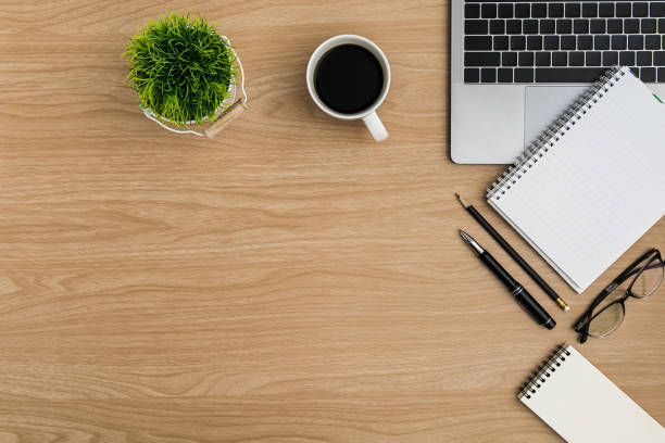 istock Top view Wood office desk table. Flat lay Workspace 1190762192