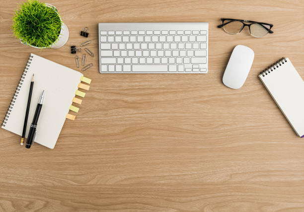 istock Top view Wood office desk table. Flat lay Workspace 1190764813