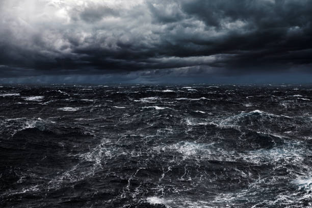 High Seas Storming Dark Clouds and Strong Stormy Winds at Ocean storming stock pictures, royalty-free photos & images