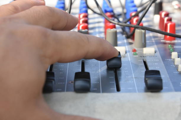istock J playing music at mixer closeup 1190771939