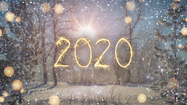 istock Sparkler text 2020 in winter forest 3D rendering illustration 1190774036
