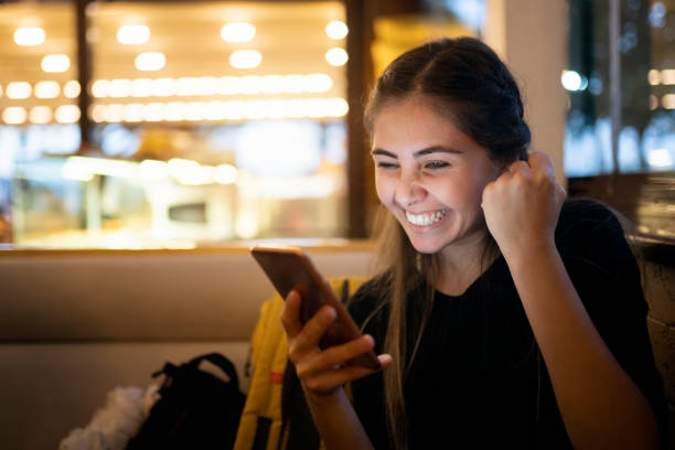Young woman using smart phone