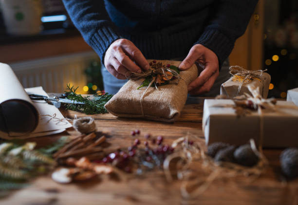 istock Man Making Christmas Gifts 1190777583