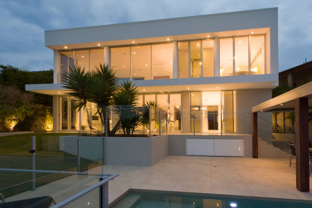 istock Luxury home at sunset 1190779823