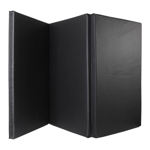 istock folding black sports mat, on a white background, thick and soft training mat 1190781491