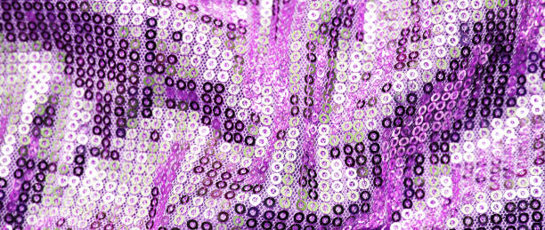 istock Lilac shiny fabric with sequins for festive backgrounds 1190781568