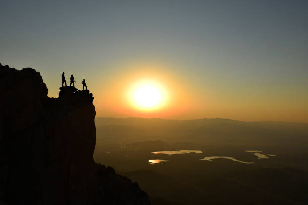 istock achievements of people walking and exploring together 1190783828
