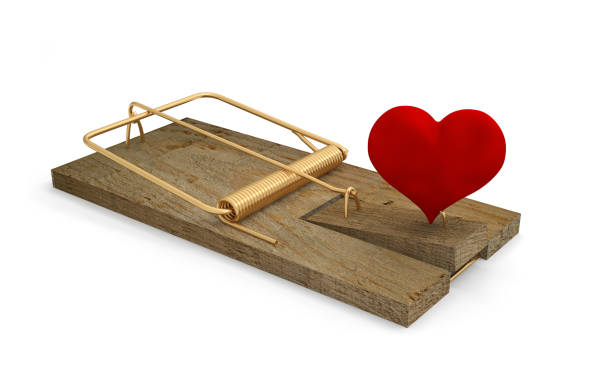 istock trap mousetrap danger risk heart love catch red protection 1190788705