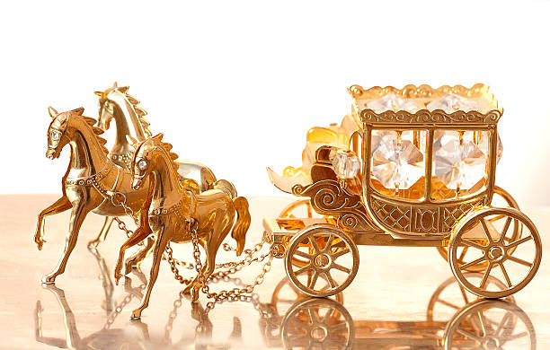 golden carriage with horses