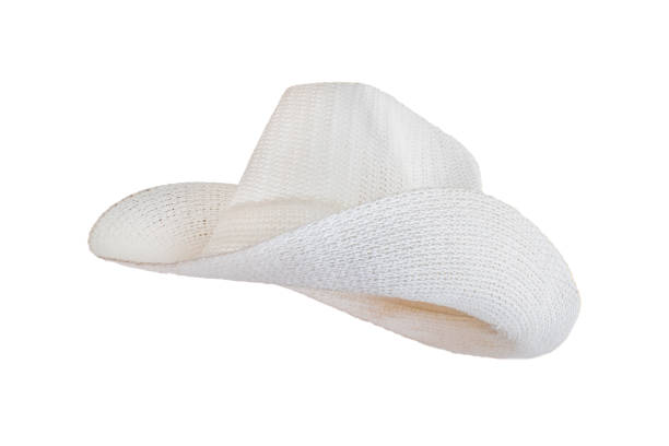 white cowboy woven hats on a white background stock photo