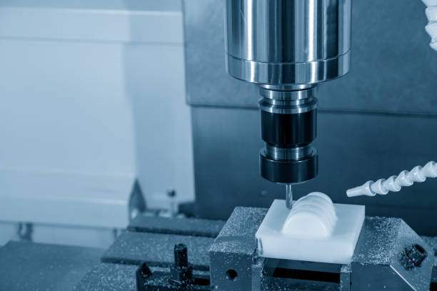 istock The CNC milling machine finishing cut the plastic parts with the solid ball  endmill tools. 1190798318