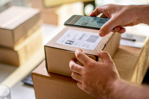 istock Delivery service, scanning a shipping label 1190799678