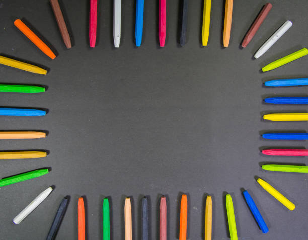 istock random set of crayon colors in a rectangle shape on a black background 1190800922