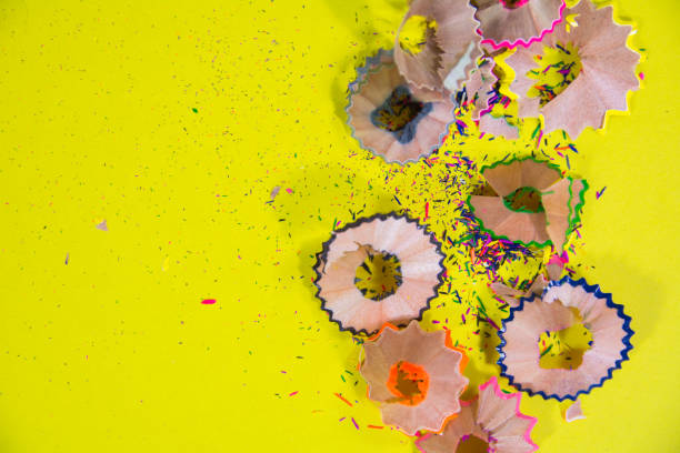 istock wooden color pencils scrape on yellow background 1190801192