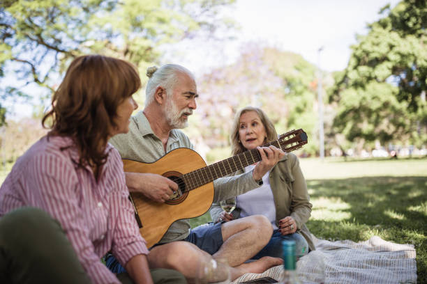 istock Group of senior friend on picnic 1190806377