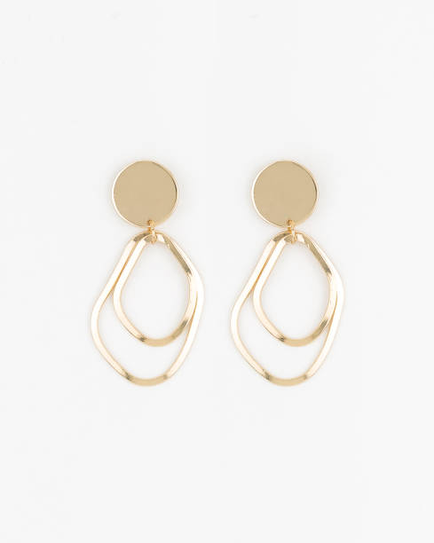 istock Elegant loop earrings with black marble and golden stone at bottom with white background stock photo 1190806693
