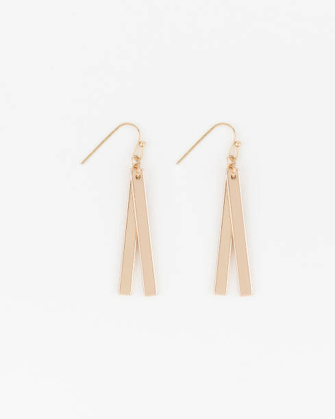 istock Elegant loop earrings with black marble and golden stone at bottom with white background stock photo 1190806762