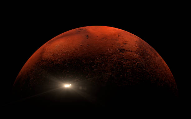 istock Small satellite travelling across the surface of Mars with strong shadows on the surface 1190806767