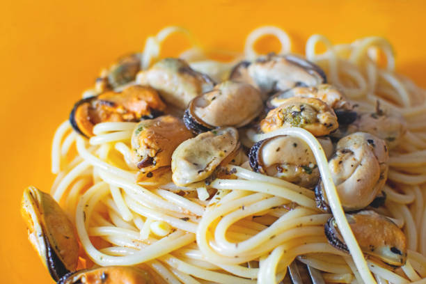 Traditional Italian spaghetti with mussels meat and spices.