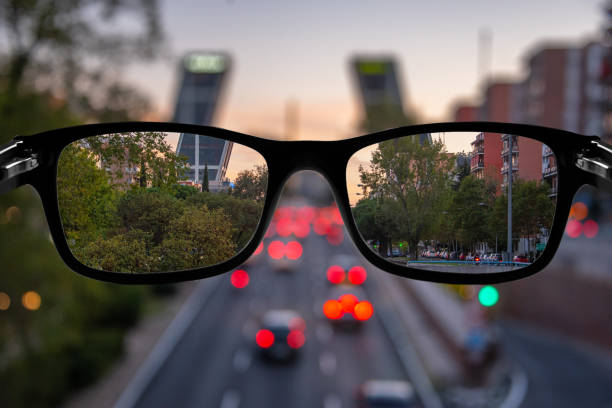istock Myopia concept: eyeglasses focusing a city 1190809158