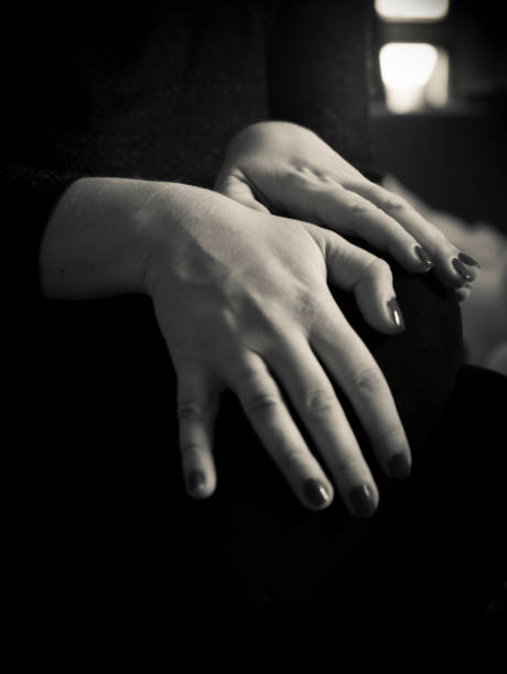 istock Woman with Hands on her Lap 1190816608
