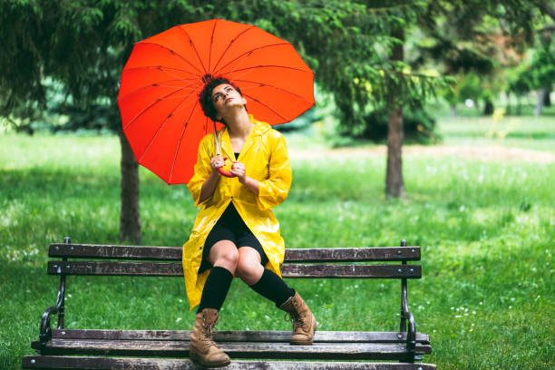 istock Sad woman on rain 1190817539