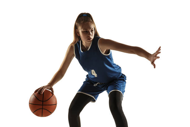 istock Young caucasian female basketball player against white studio background 1190820073