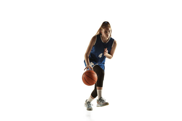 istock Young caucasian female basketball player against white studio background 1190820074