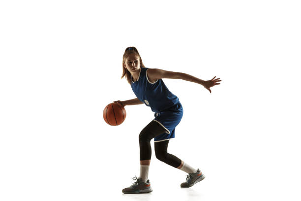 istock Young caucasian female basketball player against white studio background 1190820079