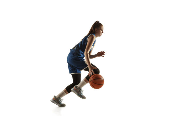 istock Young caucasian female basketball player against white studio background 1190820080