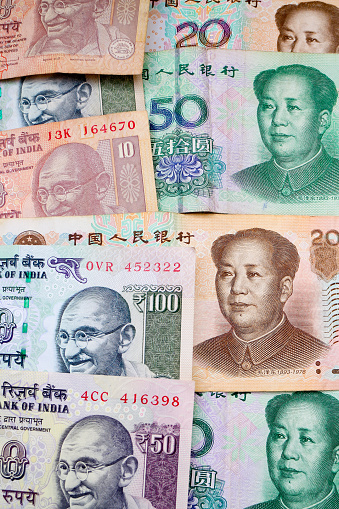Chinese Yuan And Indian Rupees Banknotes Stock Photo Download Image chinese-yuan-and-indian-rupees-banknotes-stock-photo-download-image