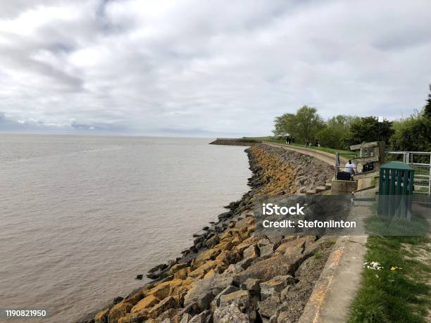 Seawall In Newport Wales Stock Photo - Download Image Now - Retaining Wall, Concrete, Wales