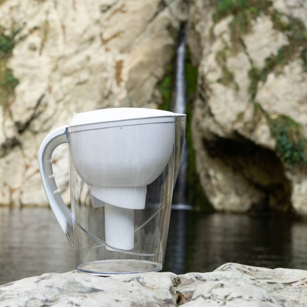 istock Water filter pitcher as a way to purify water for drinking or use for cooking. 1190825033