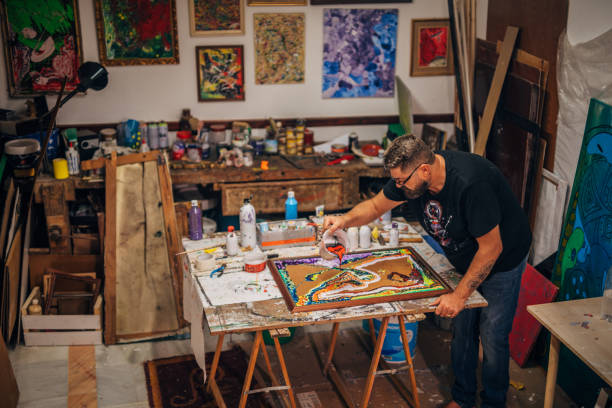 istock Male artist creating art 1190826193