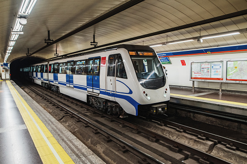 An underground train in Madrid, Spain, stopped in a station.