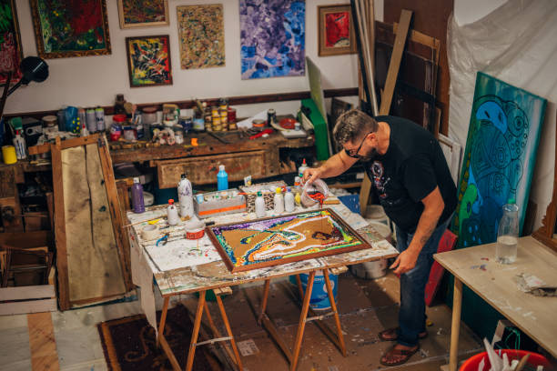 istock Male artist creating art 1190826404