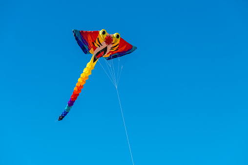 Semaphore, South Australia - April 22, 2019: Adelaide International Kite Festival at Semaphore Beach on a bright day. Event is traditionally held during Easter long weekend.