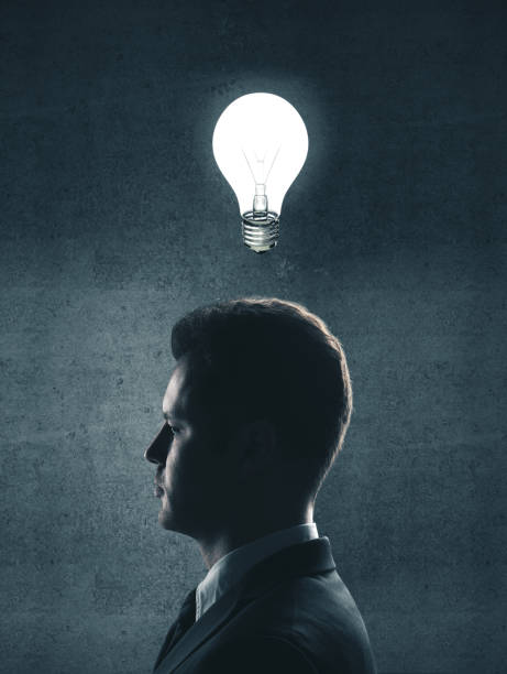istock businessman with lightbulb in head 1190829220