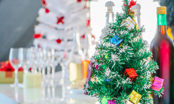 istock A small Christmas tree stands on the table. 1190831895