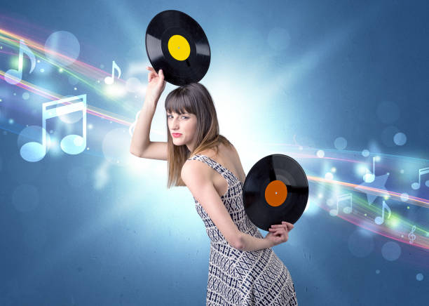 istock Lady holding vinyl record 1190832516