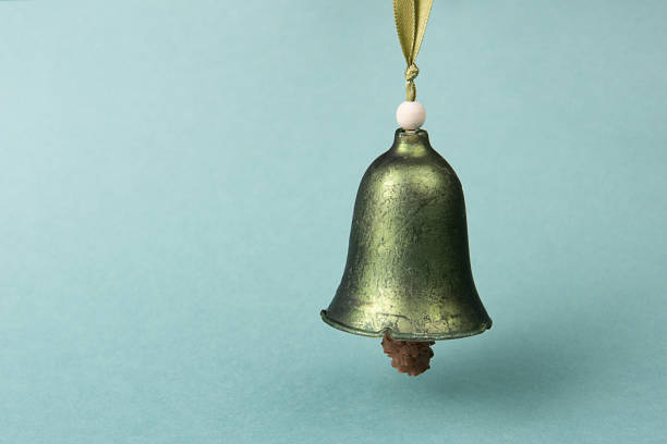 istock Christmas bell against defocused colored background. Christmas banner. 1190833231