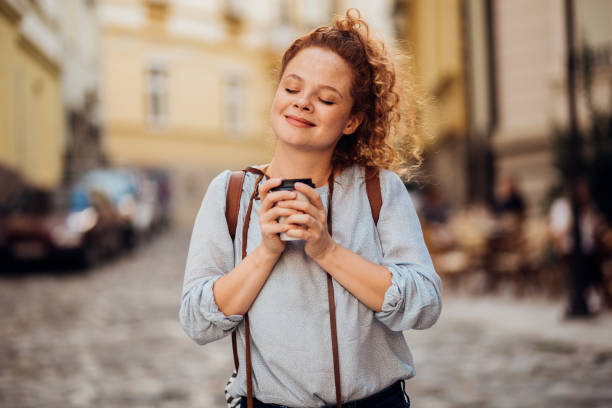 istock Girl enjoying in warm coffee 1190833861