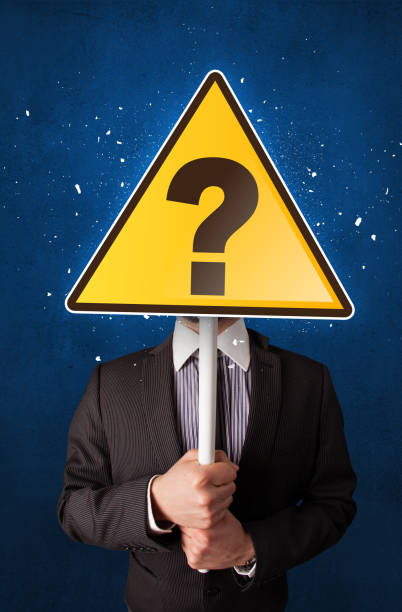istock Businessman holding question sign 1190834046