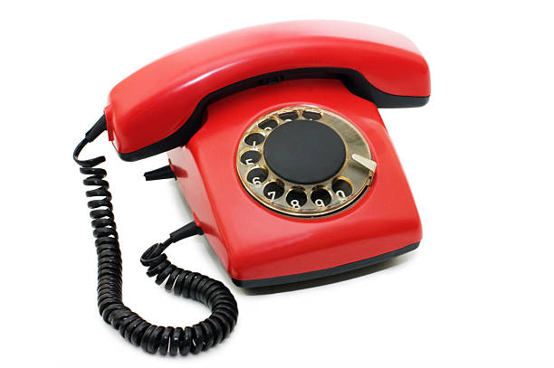 istock Red old telephone isolated on white 119083492